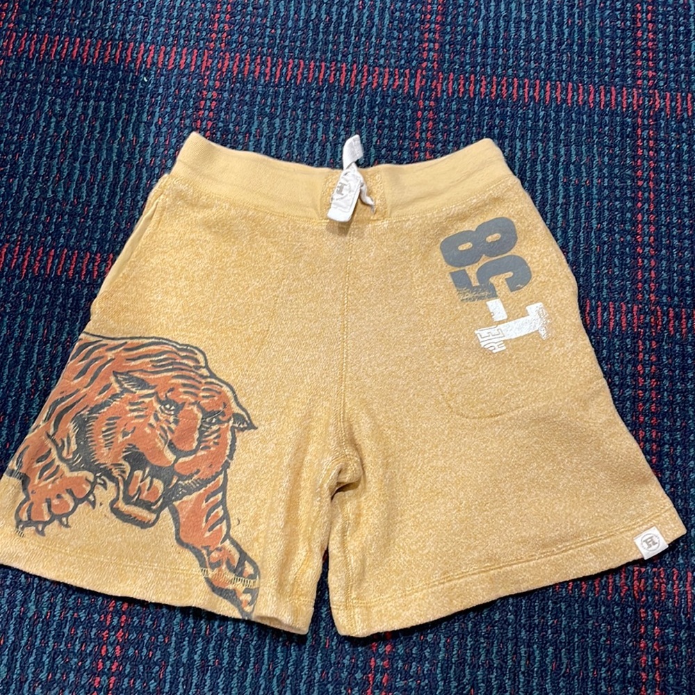 Drawstring shorts, tiger design wrapping around side, M (8-10)